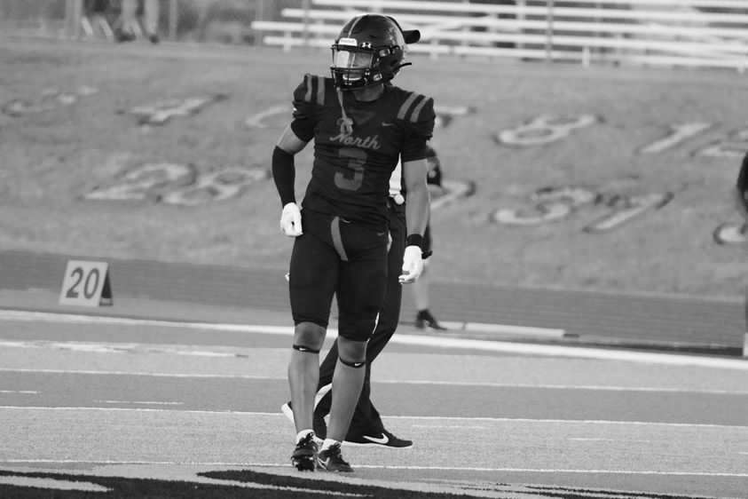 Reseller in football uniform on the field