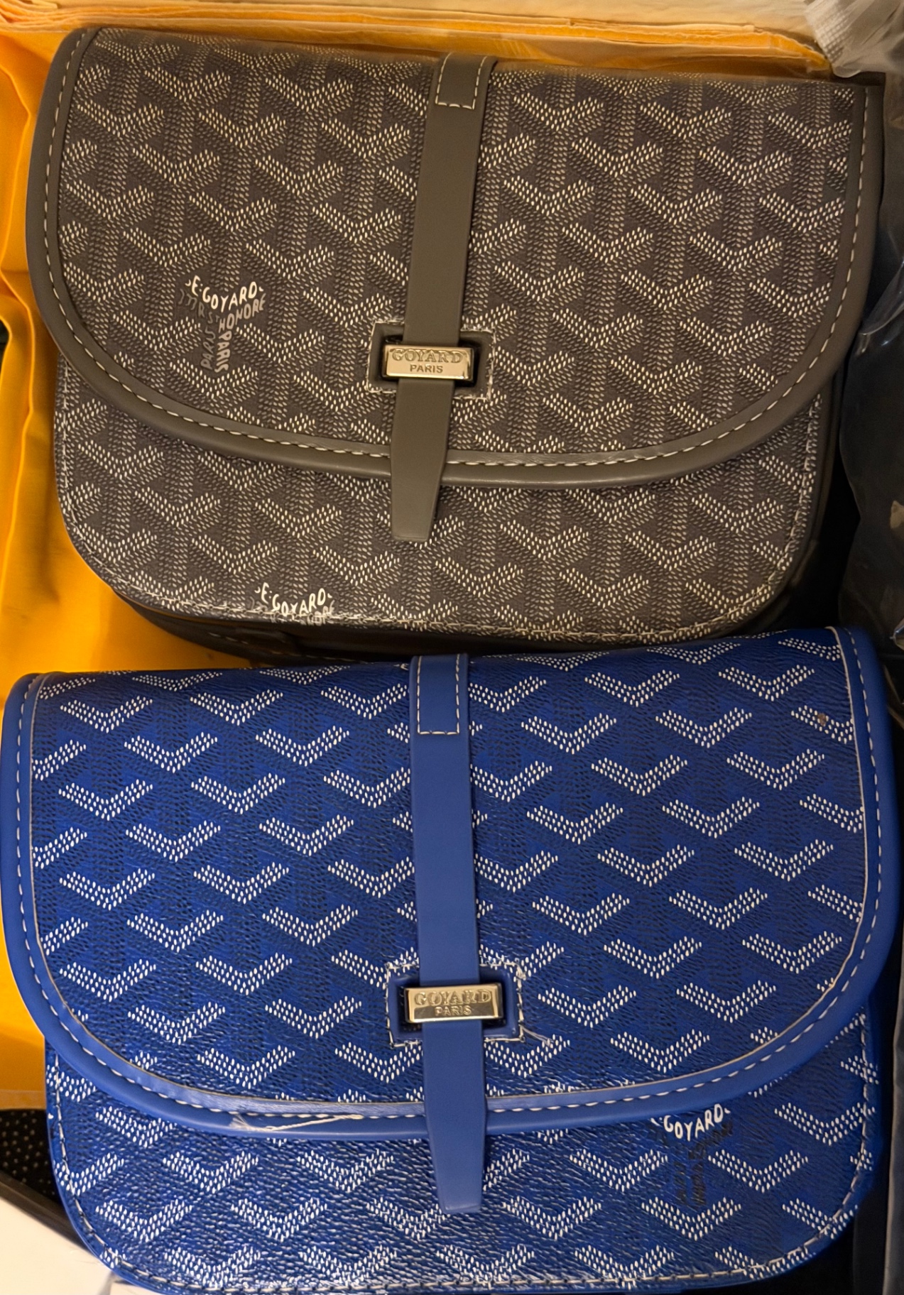 Two designer-style crossbody bags received from the purse vendor