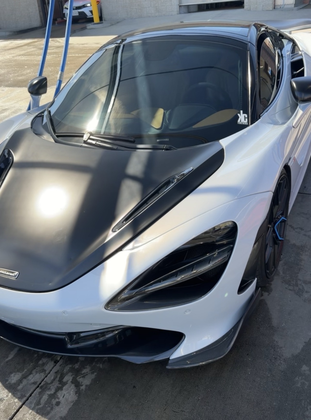 Reseller's white McLaren supercar